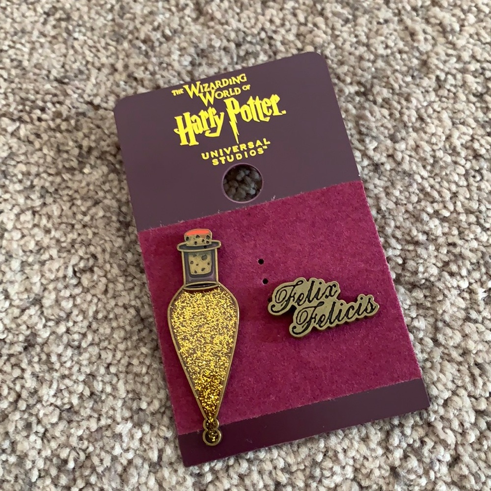 Anyone in the need of some liquid luck ??? New pin from universal Florida !!!